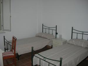 Postel nebo postele na pokoji v ubytování Tenuta Traversa