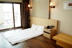 Postelja oz. postelje v sobi nastanitve Hotel Thesoom Forest