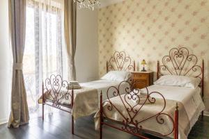 Katil atau katil-katil dalam bilik di Villa Nerone B&B +29 gambar