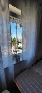 Posteľ alebo postele v izbe v ubytovaní Apartman sunny green