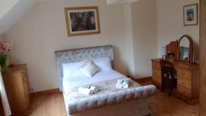 Voodi või voodid majutusasutuse Tullynacrunat Lodge toas