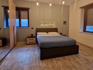 A bed or beds in a room at La Dimora dei Consoli - Holiday House Roma Vatican
