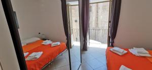 Ένα ή περισσότερα κρεβάτια σε δωμάτιο στο Casa Borgo