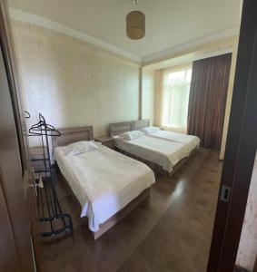 Una cama o camas en una habitación de Inn David