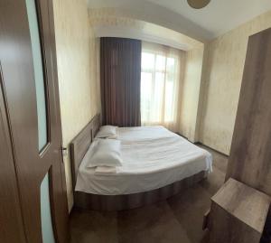 Una cama o camas en una habitación de Inn David