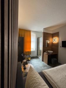 Postel nebo postele na pokoji v ubytování Hotel Garni „zum Bären“
