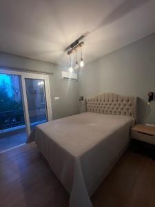 Ένα ή περισσότερα κρεβάτια σε δωμάτιο στο Elite Holiday Apartment +35 φωτογραφίες