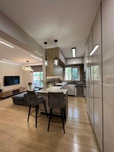 Μια τηλεόραση ή/και κέντρο ψυχαγωγίας στο Elite Holiday Apartment