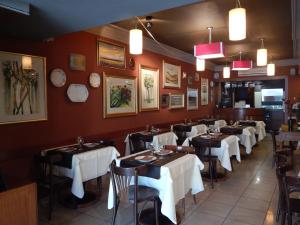 En restaurant eller et andet spisested på Hotel Americano Pergamino