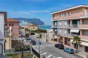 a view of a street in a city with buildings at Conero Suite in Marcelli