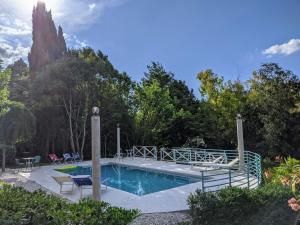 The swimming pool at or close to Italian Experience-Villa Millefiori