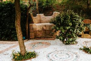 A garden outside Italian Experience-Villa Millefiori