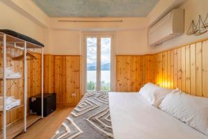 Кровать или кровати в номере Villa Perledina by Wonderful Italy