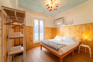 Кровать или кровати в номере Villa Perledina by Wonderful Italy