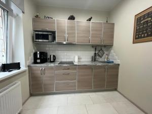 Kuchyň nebo kuchyňský kout v ubytování Apartment Jõesuu