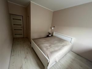 Postel nebo postele na pokoji v ubytování Apartment Jõesuu