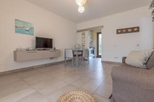 A television and/or entertainment centre at Italian Experience-CasAmare
