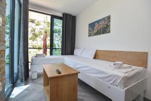 Postel nebo postele na pokoji v ubytování Apartments A Čanj