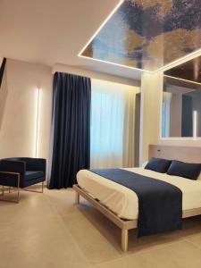 Postel nebo postele na pokoji v ubytování Shanti Rooms & Apartments Lucullo