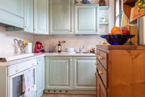 Kuchyň nebo kuchyňský kout v ubytování Italian Experience-Il Borgo Apartment