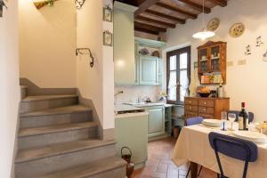 Kuchyň nebo kuchyňský kout v ubytování Italian Experience-Il Borgo Apartment
