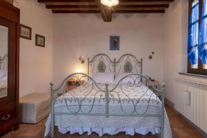 Postel nebo postele na pokoji v ubytování Italian Experience-Il Borgo Apartment