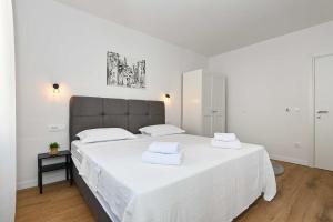 Ένα ή περισσότερα κρεβάτια σε δωμάτιο στο Dolce Vacanza 1