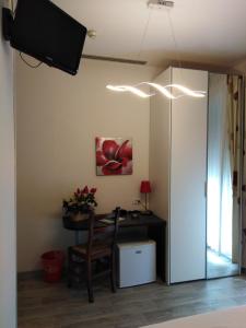 TV a/nebo společenská místnost v ubytování Hotel Vienna