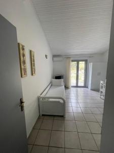 a living room with a couch and a table at Maistrato Apartments in Argostoli