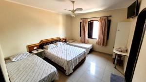 Katil atau katil-katil dalam bilik di Florence Hotel