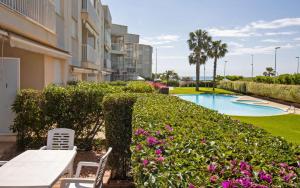 Πισίνα στο ή κοντά στο Planta baja en primera linea - Roquer Marti ALBERT VILLAS