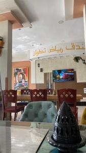 Televisor o centre d'entreteniment de Hotel Ryad Tetouan Aero