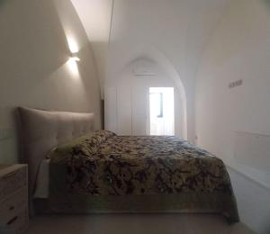 Postel nebo postele na pokoji v ubytování Giulia's Home