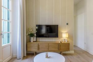 TV a/nebo společenská místnost v ubytování Marques de Velazquez II by Caleta Homes