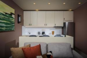 Cuisine ou kitchenette dans l'établissement Centro Vero Suites by Omilos Hotels