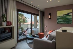 Coin salon dans l'établissement Centro Vero Suites by Omilos Hotels