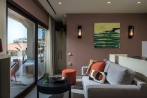 Coin salon dans l'établissement Centro Vero Suites by Omilos Hotels