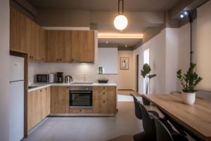 Cuisine ou kitchenette dans l'établissement Centro Vero Suites by Omilos Hotels
