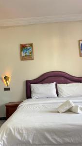 Llit o llits en una habitació de Hotel Ryad Tetouan Aero