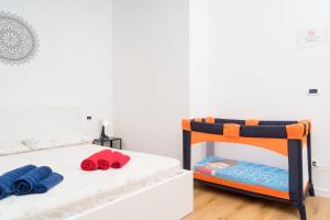 a bedroom with two bunk beds with towels on them at Cleo Viola in Ancona