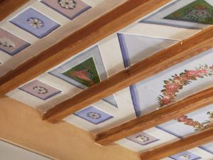 an image of a ceiling with paintings on it at Residenza D'Epoca San Lorenzo Tre in Todi