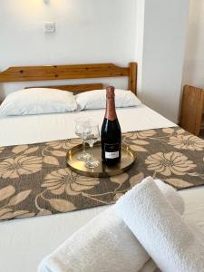 Postel nebo postele na pokoji v ubytování Hotel Katia