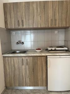 Kuchyň nebo kuchyňský kout v ubytování Hotel Katia