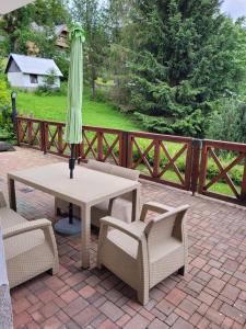 Vonkajšia záhrada v ubytovaní PENSION KUBU Apartment 3 samostatný byt s kuchyní