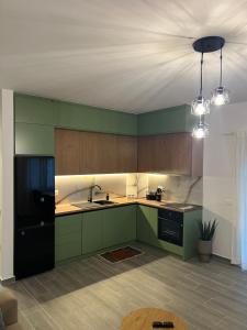 Η κουζίνα ή μικρή κουζίνα στο Luxe Verde Orikum Vlore