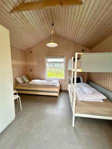 Arhus Cottage and Camping客房内的一张或多张床位