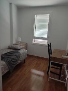 Postel nebo postele na pokoji v ubytování Villa Milena