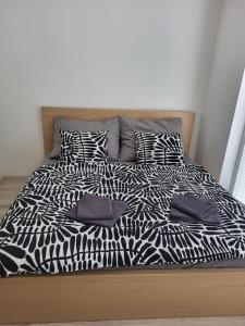 Letto o letti in una camera di City Center Apartments - Moderna Brno Římské náměstí V