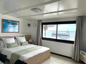 Кровать или кровати в номере Blue Beryl Guest House