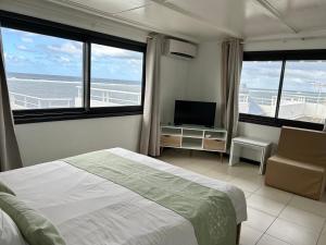 Кровать или кровати в номере Blue Beryl Guest House